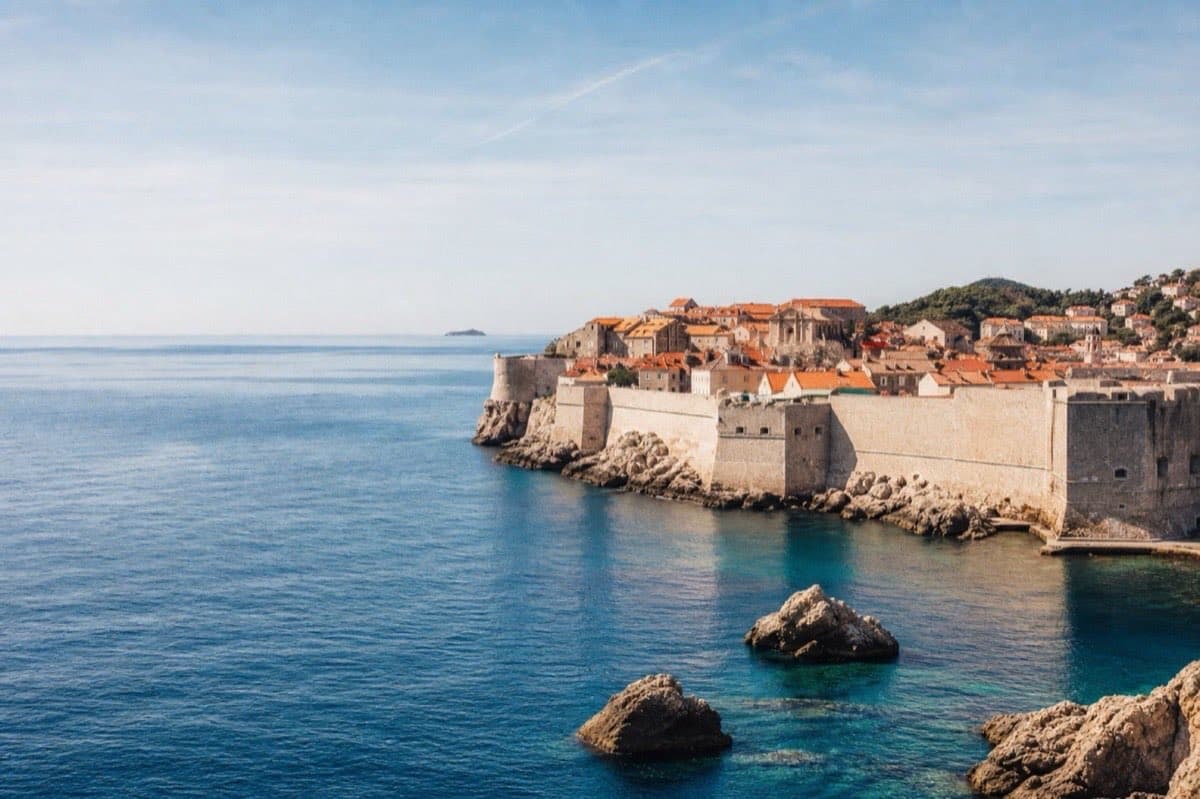 Dubrovnik old town walls and Adriatic coastline in clear daylight, Croatia
