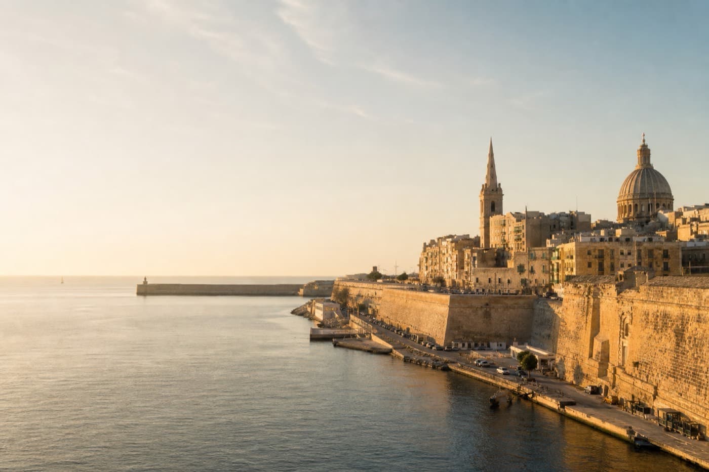 Valletta limestone bastions and Grand Harbour in warm Mediterranean light, Malta