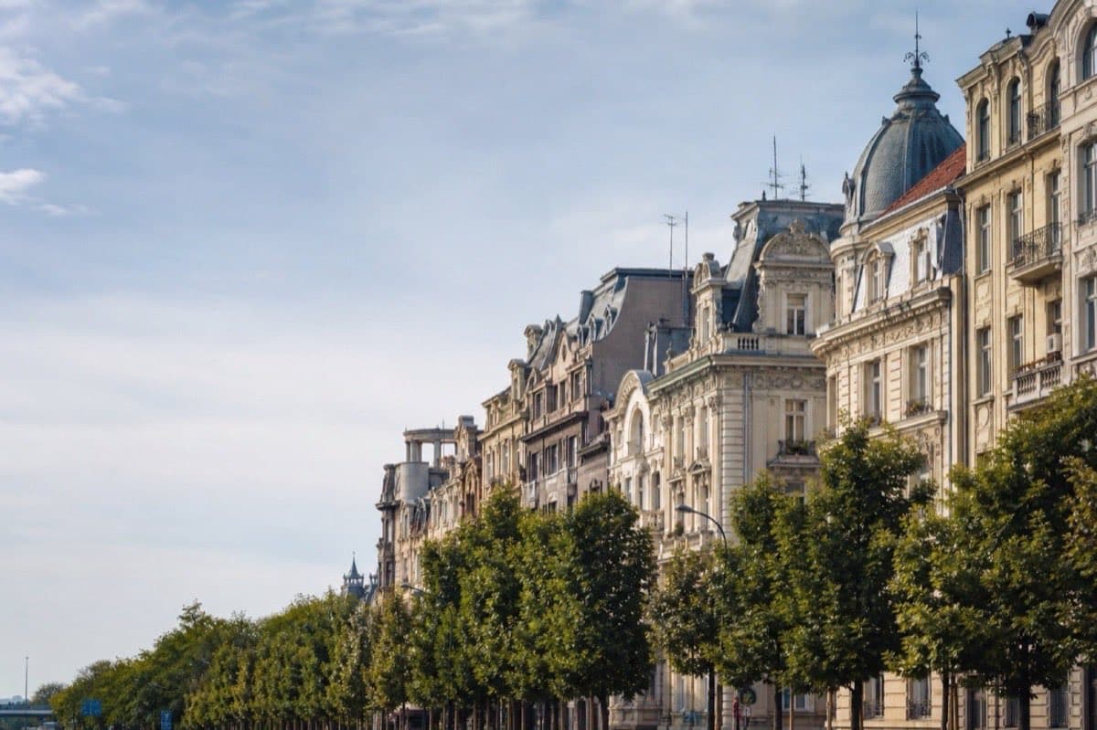 Bucharest boulevard with eclectic architecture and tree-lined streets, Romania